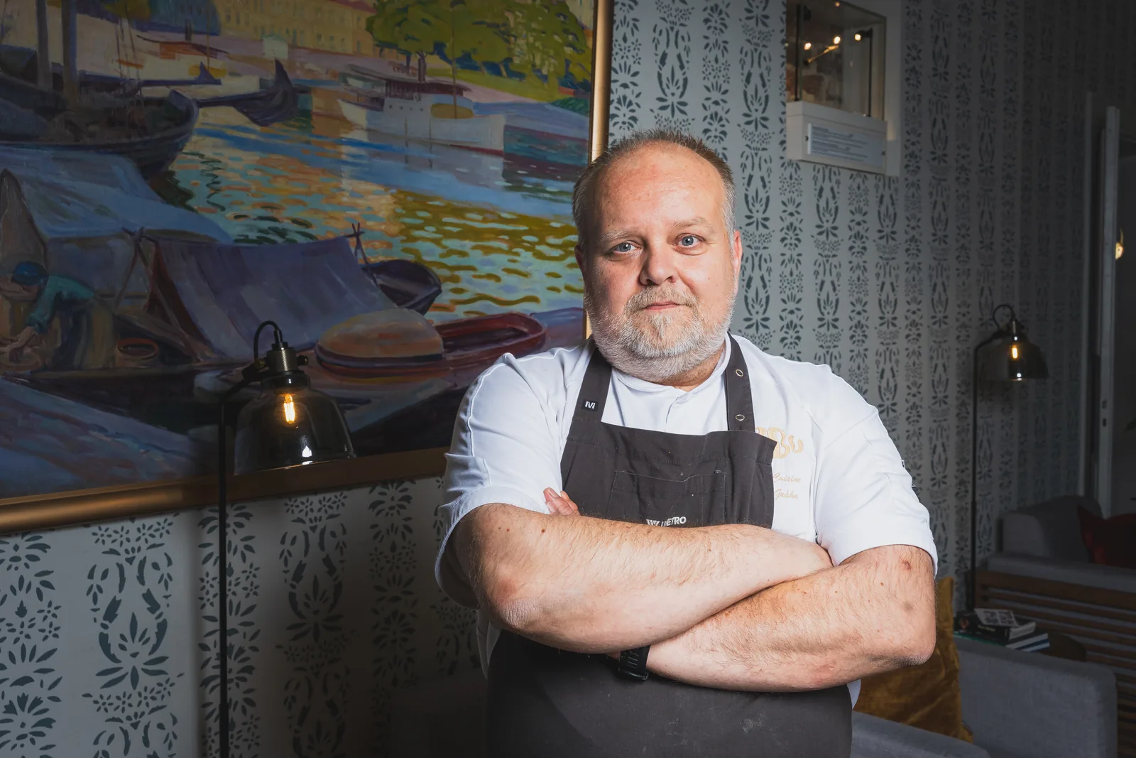 OOBU's head chef in front of the kitchen